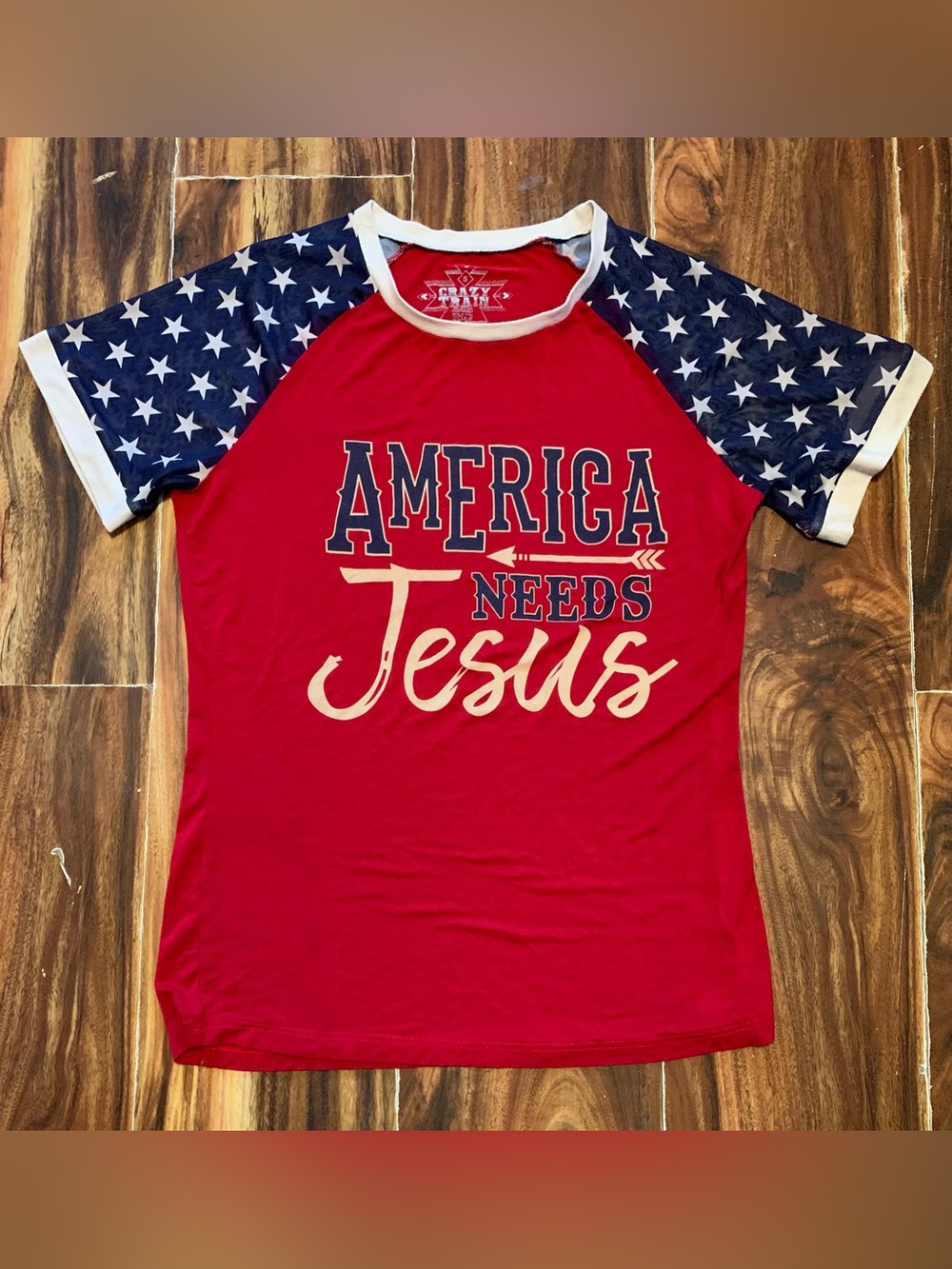 Crazy Train Women’s Patriotic “American Needs Jesus” Small T-Shirt. 3507